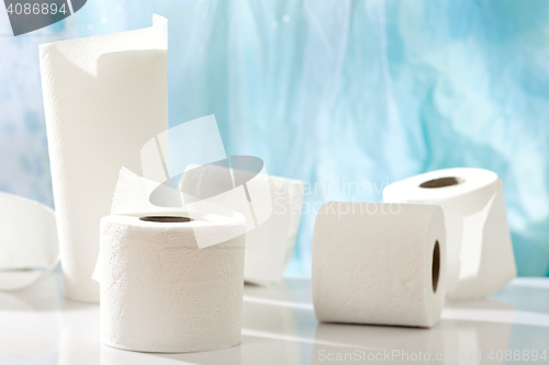 Image of paper rolls on white table