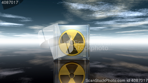 Image of nuclear symbol under cloudy sky - 3d illustration