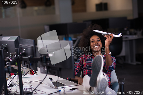 Image of portrait of a young successful African-American woman in modern 