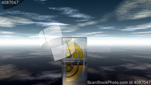 Image of rss symbol in glass cube under cloudy blue sky - 3d illustration