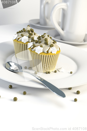 Image of two delicious cupcakes on a plate