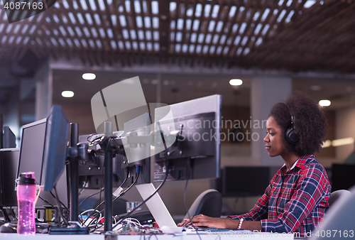 Image of portrait of a young successful African-American woman in modern 
