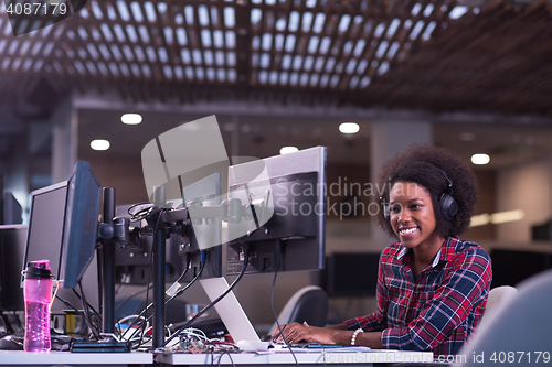Image of portrait of a young successful African-American woman in modern 
