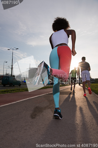 Image of multiethnic group of people on the jogging