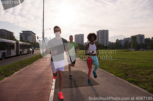 Image of multiethnic group of people on the jogging