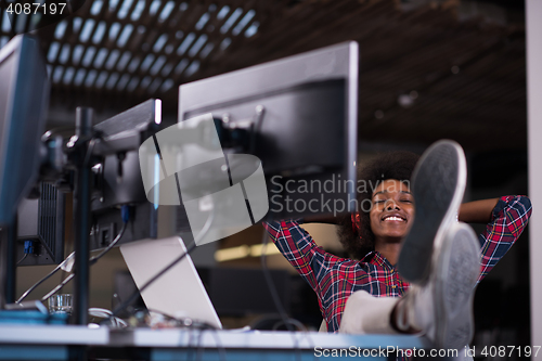 Image of portrait of a young successful African-American woman in modern 