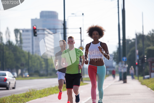 Image of multiethnic group of people on the jogging