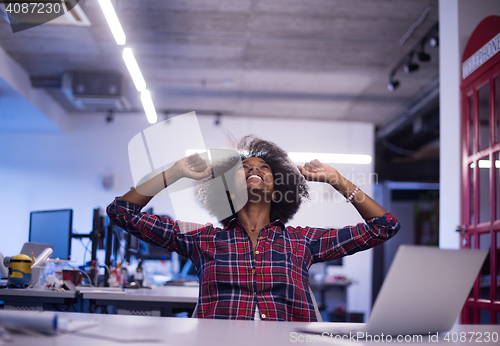 Image of portrait of a young successful African-American woman in modern 