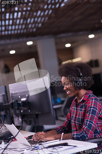 Image of portrait of a young successful African-American woman in modern 