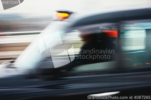 Image of Taxi car in motion