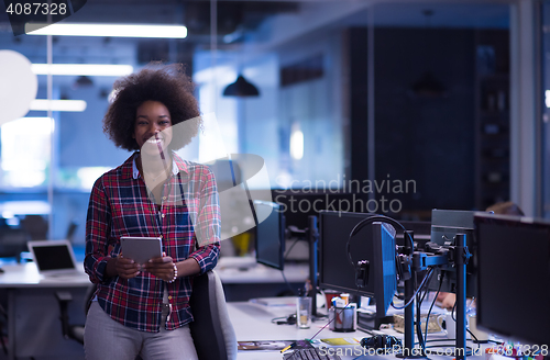 Image of portrait of a young successful African-American woman in modern 