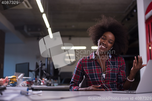 Image of portrait of a young successful African-American woman in modern 