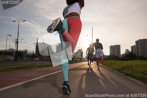 Image of multiethnic group of people on the jogging