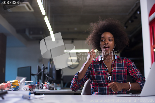 Image of portrait of a young successful African-American woman in modern 