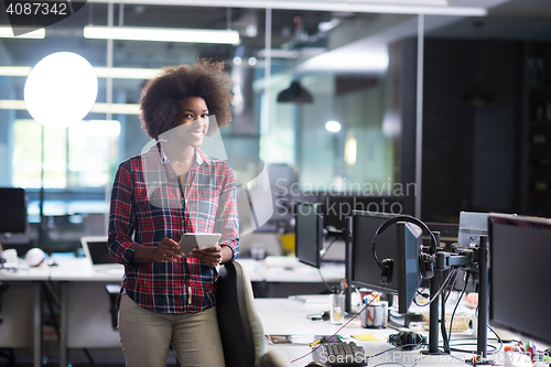 Image of portrait of a young successful African-American woman in modern 