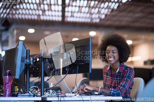 Image of portrait of a young successful African-American woman in modern 