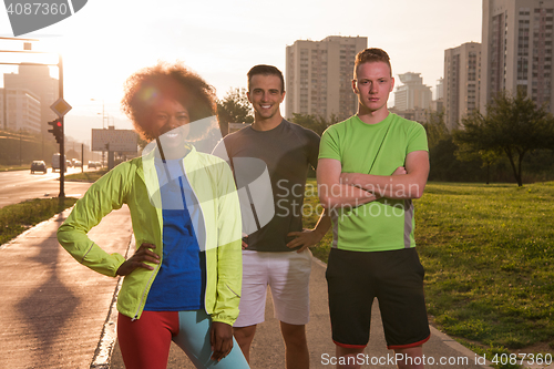 Image of portrait multiethnic group of people on the jogging