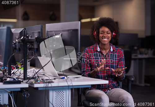 Image of portrait of a young successful African-American woman in modern 