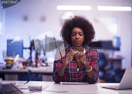 Image of portrait of a young successful African-American woman in modern 