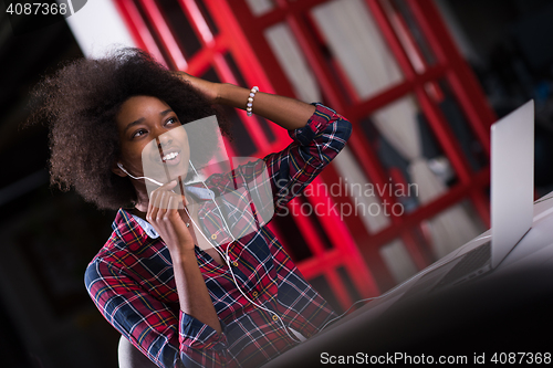 Image of portrait of a young successful African-American woman in modern 