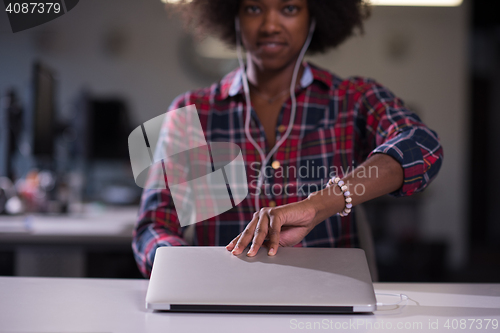 Image of portrait of a young successful African-American woman in modern 