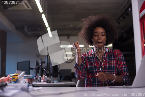 Image of portrait of a young successful African-American woman in modern 