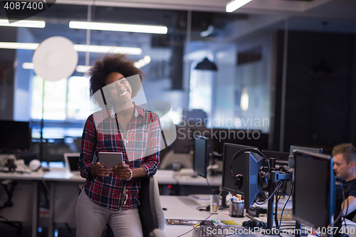 Image of portrait of a young successful African-American woman in modern 