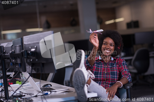 Image of portrait of a young successful African-American woman in modern 