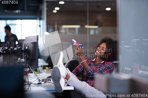 Image of portrait of a young successful African-American woman in modern 