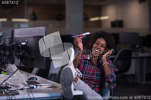 Image of portrait of a young successful African-American woman in modern 