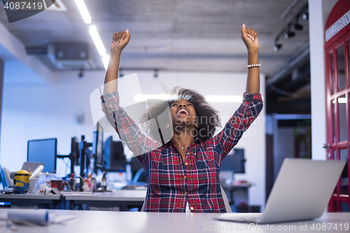 Image of portrait of a young successful African-American woman in modern 