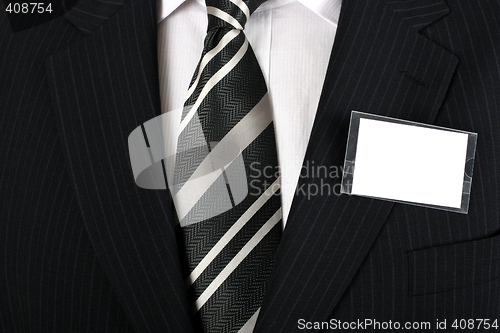 Image of Blank nametag on a well dressed man