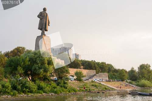 Image of Volgograd, Russia - August 1, 2016: View of the sunset on the promenade and a statue of Lenin in the Krasnoarmeysk district of Volgograd