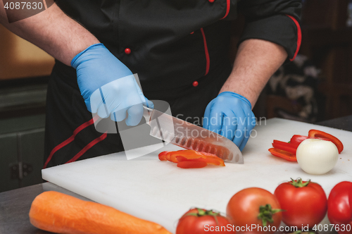 Image of Chef cutting vegetables
