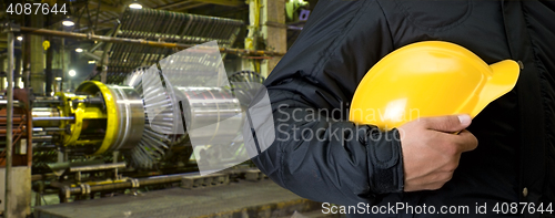 Image of Worker with safety helmet