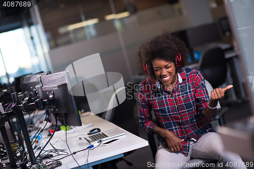 Image of portrait of a young successful African-American woman in modern 