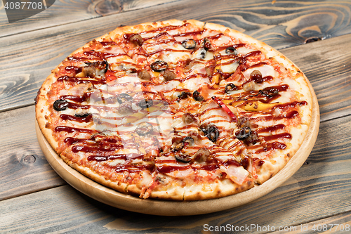 Image of Pizza On An Old Wooden Desk