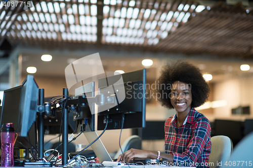 Image of portrait of a young successful African-American woman in modern 