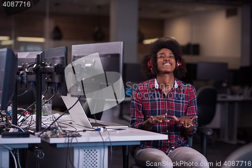 Image of portrait of a young successful African-American woman in modern 