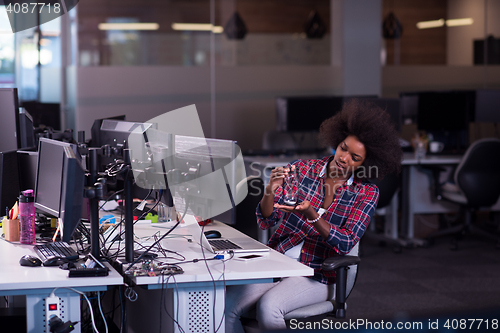 Image of portrait of a young successful African-American woman in modern 