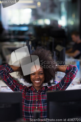 Image of portrait of a young successful African-American woman in modern 