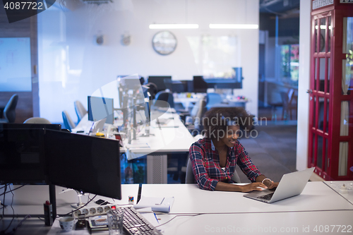 Image of portrait of a young successful African-American woman in modern 