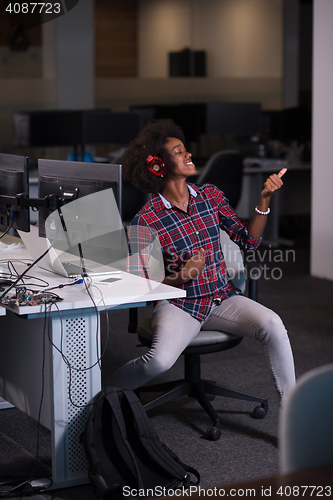 Image of portrait of a young successful African-American woman in modern 