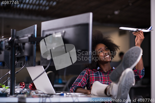 Image of portrait of a young successful African-American woman in modern 