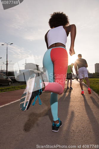 Image of multiethnic group of people on the jogging