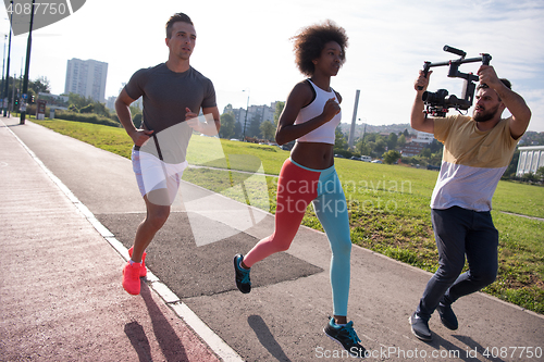 Image of multiethnic group of people on the jogging