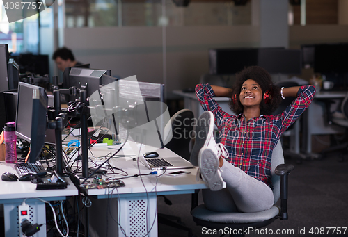 Image of portrait of a young successful African-American woman in modern 