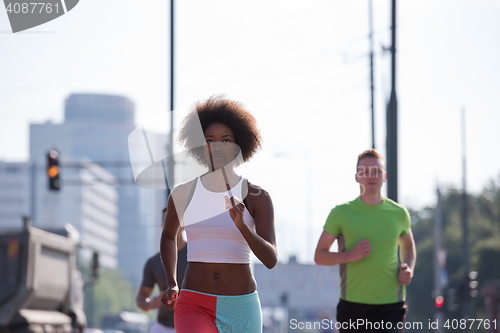 Image of multiethnic group of people on the jogging