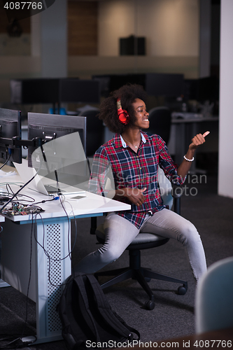 Image of portrait of a young successful African-American woman in modern 