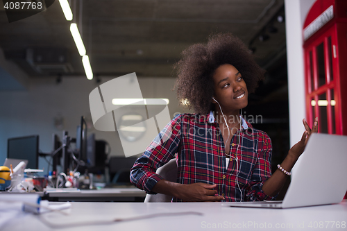 Image of portrait of a young successful African-American woman in modern 